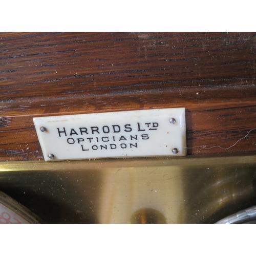 231 - A RECORDING BAROGRAPH RETAILED BY HARRODS, LONDON, CIRCA 1920oak case with ivorine retailer's plate,... 