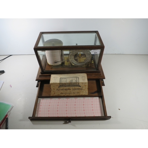 231 - A RECORDING BAROGRAPH RETAILED BY HARRODS, LONDON, CIRCA 1920oak case with ivorine retailer's plate,... 