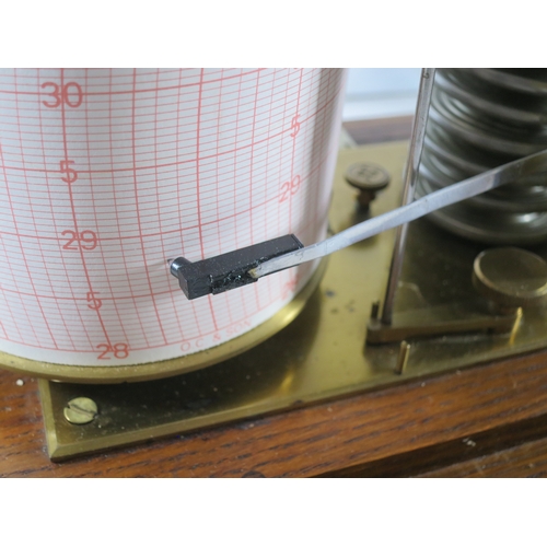 231 - A RECORDING BAROGRAPH RETAILED BY HARRODS, LONDON, CIRCA 1920oak case with ivorine retailer's plate,... 