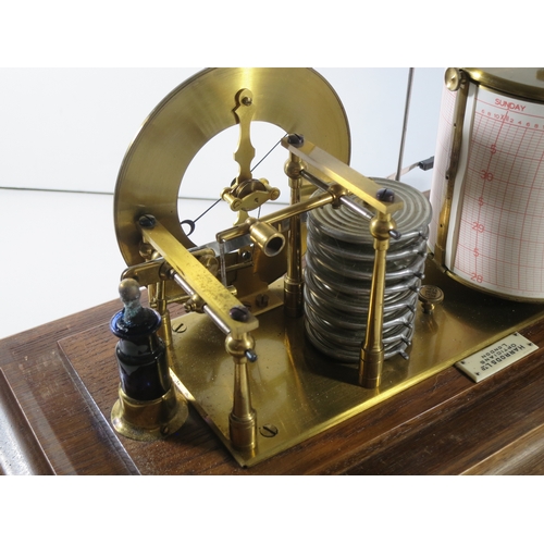 231 - A RECORDING BAROGRAPH RETAILED BY HARRODS, LONDON, CIRCA 1920oak case with ivorine retailer's plate,... 