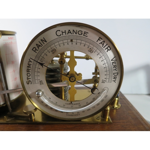 231 - A RECORDING BAROGRAPH RETAILED BY HARRODS, LONDON, CIRCA 1920oak case with ivorine retailer's plate,... 