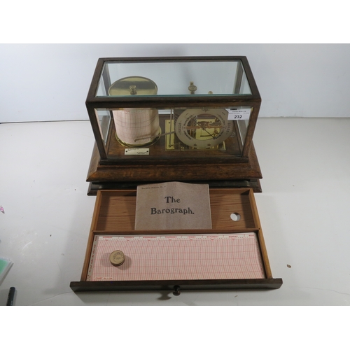 232 - A RECORDING BAROGRAPH RETAILED BY SHARMAN D NEILL, BELFAST, CIRCA 1920oak case with divided chart dr... 