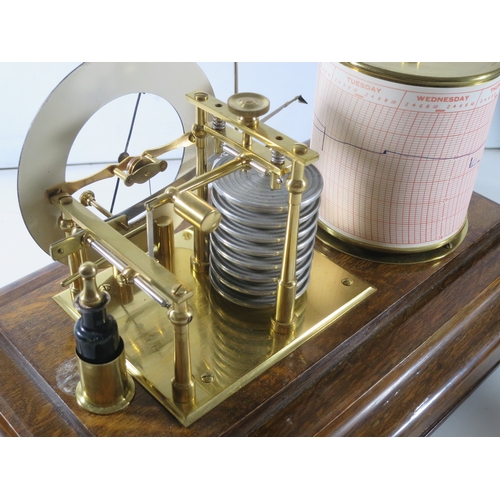 232 - A RECORDING BAROGRAPH RETAILED BY SHARMAN D NEILL, BELFAST, CIRCA 1920oak case with divided chart dr... 