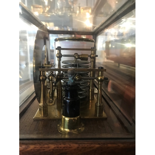 231 - A RECORDING BAROGRAPH RETAILED BY HARRODS, LONDON, CIRCA 1920oak case with ivorine retailer's plate,... 