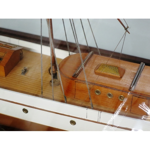 54 - A MODEL OF THE STEAM YACHT VENUS, CIRCA 1902the 40in. carved hull painted tan below the waterline, b... 