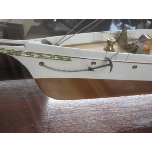 54 - A MODEL OF THE STEAM YACHT VENUS, CIRCA 1902the 40in. carved hull painted tan below the waterline, b... 