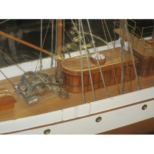 54 - A MODEL OF THE STEAM YACHT VENUS, CIRCA 1902the 40in. carved hull painted tan below the waterline, b... 