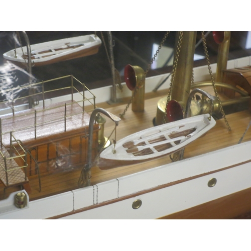 54 - A MODEL OF THE STEAM YACHT VENUS, CIRCA 1902the 40in. carved hull painted tan below the waterline, b... 