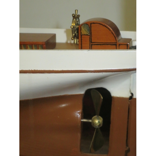 54 - A MODEL OF THE STEAM YACHT VENUS, CIRCA 1902the 40in. carved hull painted tan below the waterline, b... 