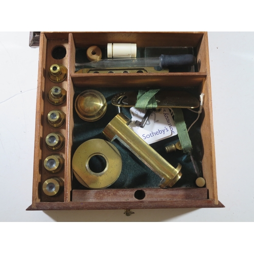 255 - A CUFF-TYPE MICROSCOPE BY DOLLOND, CIRCA 1800signed on the cruciform stage Dollond London, the squar... 