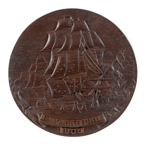 218 - A NAVAL DOCKYARD WOODEN BADGE TEMPLATE FOR H.M.S. IRON DUKE, 1912
carved in oak with a lion holding ... 