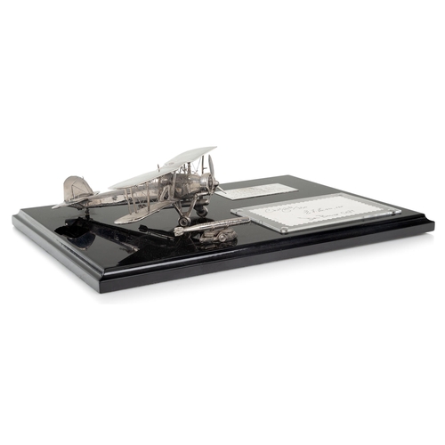 243 - A MODERN SILVER MODEL OF A FAIREY SWORDFISH COMMEMORATING THE ATTACK ON SCHARNHORST 12TH FEBRUARY 19... 