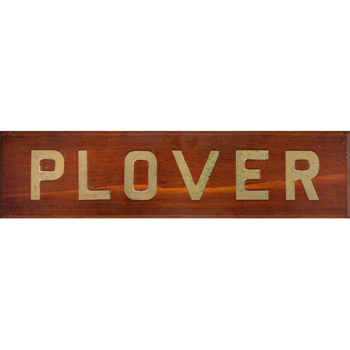 264 - A NAMEPLATE FROM H.M. PATROL BOAT PLOVER, 1984
with 1in. brass lettering, secured to wooden display ... 