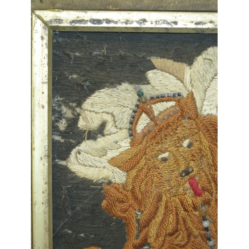 181 - A 19TH CENTURY SAILOR'S WOOLWORK PICTURE AND FRAME
depicting the Royal Arms with raised silkwork lio... 