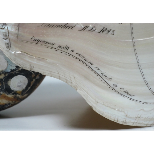 23 - A LARGE-SIZED MID-19TH CENTURY SCRIMSHAW WORKED NAUTILUS SHELL BY C.H. WOOD
incised overall with des... 