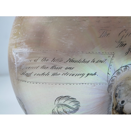 23 - A LARGE-SIZED MID-19TH CENTURY SCRIMSHAW WORKED NAUTILUS SHELL BY C.H. WOOD
incised overall with des... 