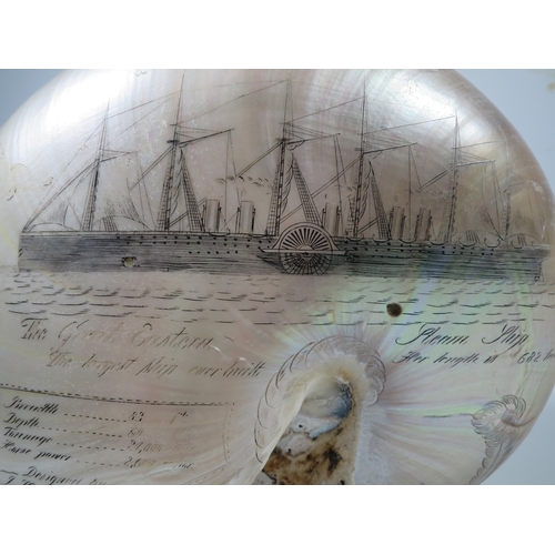 23 - A LARGE-SIZED MID-19TH CENTURY SCRIMSHAW WORKED NAUTILUS SHELL BY C.H. WOOD
incised overall with des... 