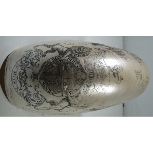 23 - A LARGE-SIZED MID-19TH CENTURY SCRIMSHAW WORKED NAUTILUS SHELL BY C.H. WOOD
incised overall with des... 