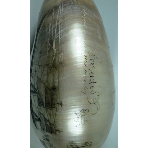 23 - A LARGE-SIZED MID-19TH CENTURY SCRIMSHAW WORKED NAUTILUS SHELL BY C.H. WOOD
incised overall with des... 