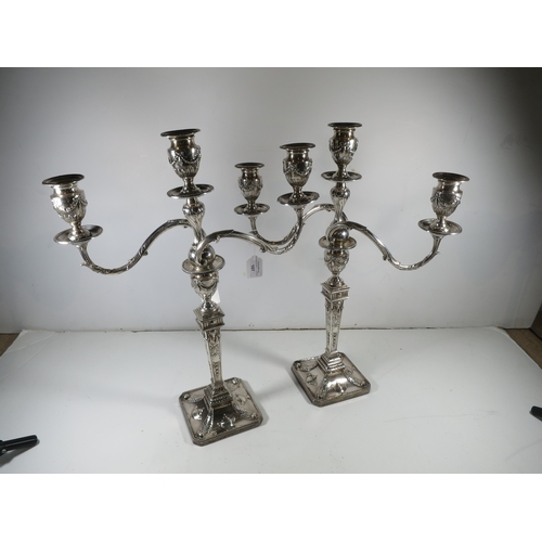 107 - A PAIR OF GEORGE III SILVER CANDLESTICKS
hallmarked for Fenton, Creswick & Co, 1777, square outl... 