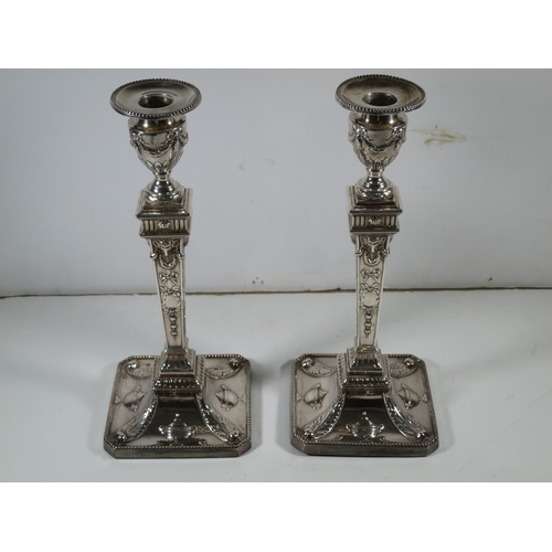 107 - A PAIR OF GEORGE III SILVER CANDLESTICKS
hallmarked for Fenton, Creswick & Co, 1777, square outl... 