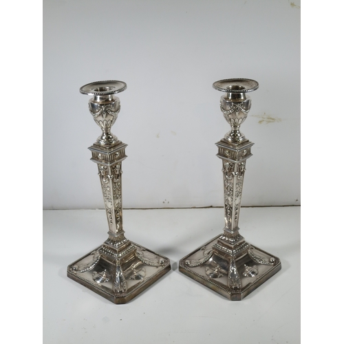 107 - A PAIR OF GEORGE III SILVER CANDLESTICKS
hallmarked for Fenton, Creswick & Co, 1777, square outl... 