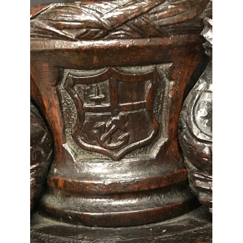 127 - AN HISTORICALLY INTERESTING STANDISH, CARVED FROM TIMBER RECOVERED FROM THE WRECK OF H.M.S. LUTINE
t... 