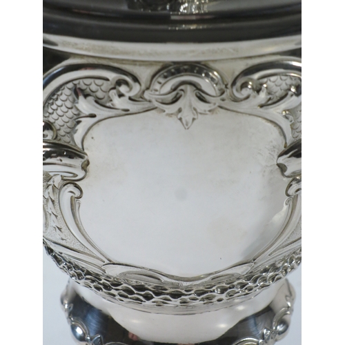 32 - A 19TH CENTURY SILVER YACHTING TROPHY
comprising a two handled covered cup repoussé yacht racing sce... 