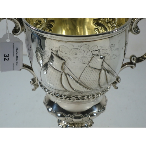 32 - A 19TH CENTURY SILVER YACHTING TROPHY
comprising a two handled covered cup repoussé yacht racing sce... 