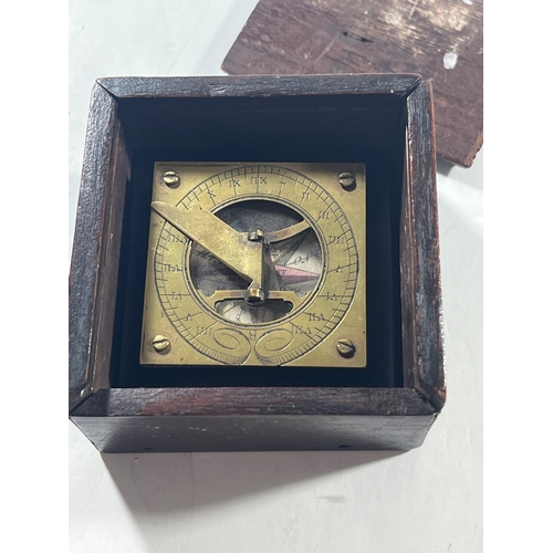 117 - A LATE 19TH CENTURY PORTABLE COMPASS SUNDIAL
unsigned with engraved brass plate, fixed latitude fold... 