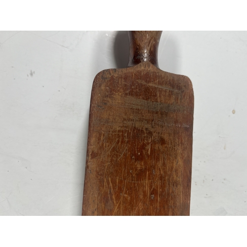 140 - A 19TH CENTURY PILL MACHINE
of typical form, brass mounted, with roller -- 16½in. (42cm.) widetwo cr... 