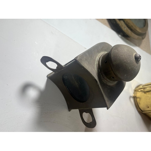 146 - A TELEGRAPH SIDE LAMP
with chimney and back handles, lacking burner -- 10in. (25.5cm.) high; togethe... 