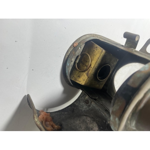 146 - A TELEGRAPH SIDE LAMP
with chimney and back handles, lacking burner -- 10in. (25.5cm.) high; togethe... 