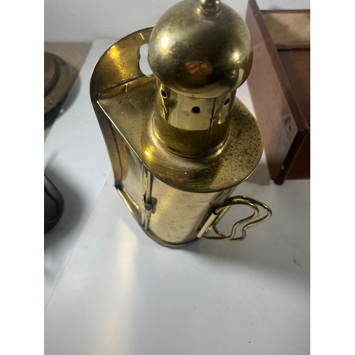 146 - A TELEGRAPH SIDE LAMP
with chimney and back handles, lacking burner -- 10in. (25.5cm.) high; togethe... 