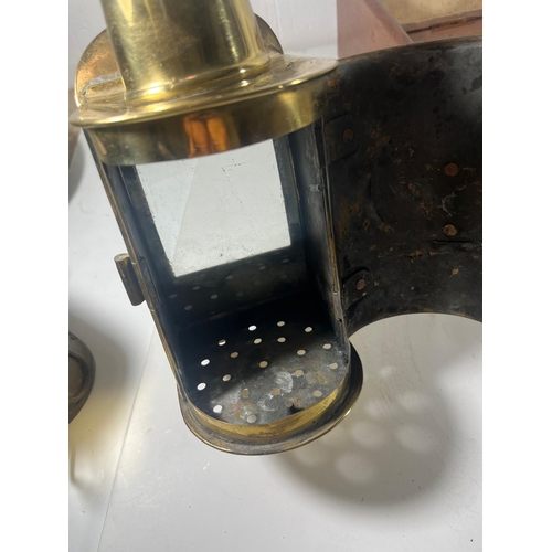 146 - A TELEGRAPH SIDE LAMP
with chimney and back handles, lacking burner -- 10in. (25.5cm.) high; togethe... 