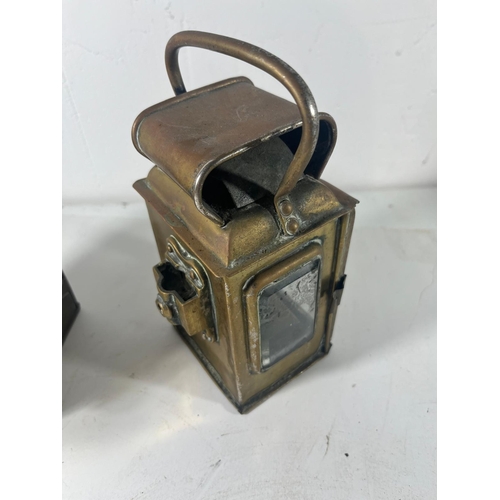 147 - TWO RAILWAY LAMPS, CIRCA 1940
comprising two railway lamps, inscribed MUTLOW 1941 and DROOM ACOOCH.X... 