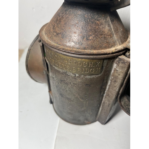 147 - TWO RAILWAY LAMPS, CIRCA 1940
comprising two railway lamps, inscribed MUTLOW 1941 and DROOM ACOOCH.X... 