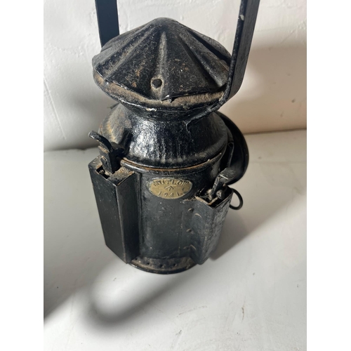 147 - TWO RAILWAY LAMPS, CIRCA 1940
comprising two railway lamps, inscribed MUTLOW 1941 and DROOM ACOOCH.X... 