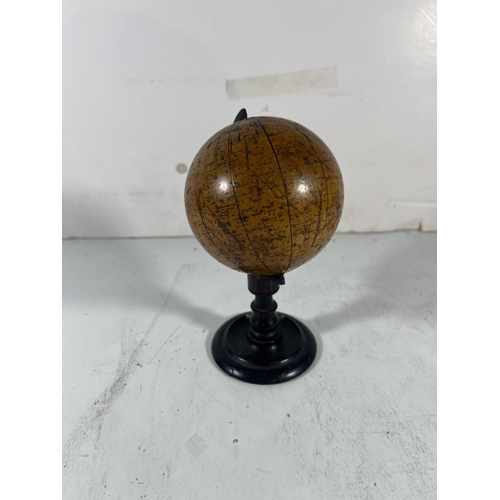 153 - A 4IN. TERRESTRIAL DESK GLOBE BY SMITH & SON, LONDON, 1867
12 printede gores with hand outlined red ... 