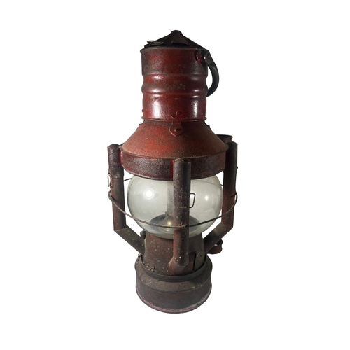 45 - AN IMPROVED DAN BUOY LAMP, CIRCA 1900
with globe shade, embossed Sherwoods to wick adjuster, and mou... 