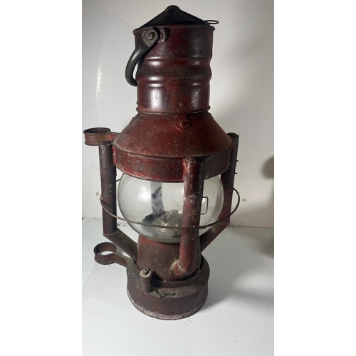 45 - AN IMPROVED DAN BUOY LAMP, CIRCA 1900
with globe shade, embossed Sherwoods to wick adjuster, and mou... 