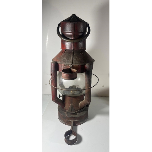 45 - AN IMPROVED DAN BUOY LAMP, CIRCA 1900
with globe shade, embossed Sherwoods to wick adjuster, and mou... 