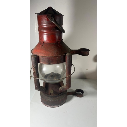 45 - AN IMPROVED DAN BUOY LAMP, CIRCA 1900
with globe shade, embossed Sherwoods to wick adjuster, and mou... 