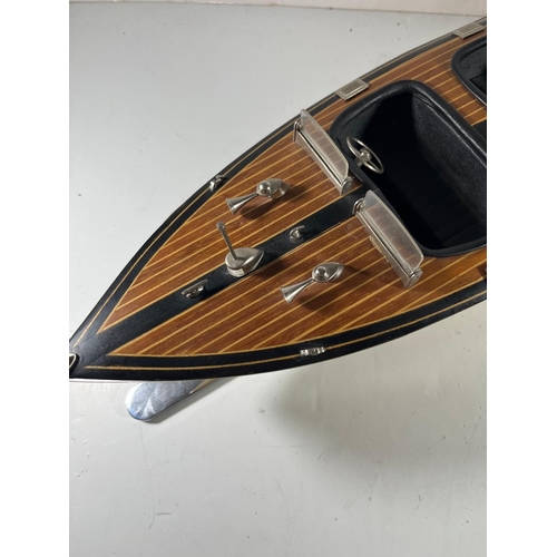 48 - MODERN STATIC DISPLAY MODEL OF A RIVA MOTOR LAUNCH
wooden hull with metal fittings, mounted on a chr... 