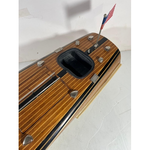 48 - MODERN STATIC DISPLAY MODEL OF A RIVA MOTOR LAUNCH
wooden hull with metal fittings, mounted on a chr... 