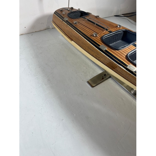 48 - MODERN STATIC DISPLAY MODEL OF A RIVA MOTOR LAUNCH
wooden hull with metal fittings, mounted on a chr... 