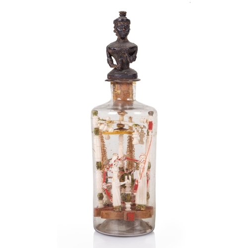 66 - A RARE EARLY 19TH CENTURY FRENCH NAPOLEONIC PRISONER-OF-WAR BONE SPINNING JENNY IN A BOTTLE, CIRCA 1... 