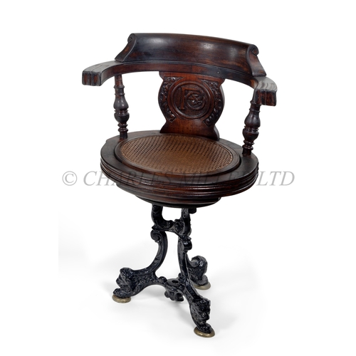 106 - A P&O FIRST CLASS DINING SALOON CHAIR, CIRCA 1910
of cast iron and mahogany, finely carved compa... 