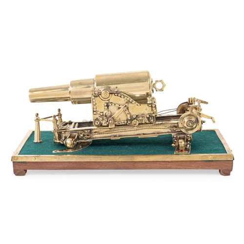 267 - CAST BRASS MODEL MUZZLE LOADING GUN [1860]
comprising three stage barrel mounted on slider to articu... 