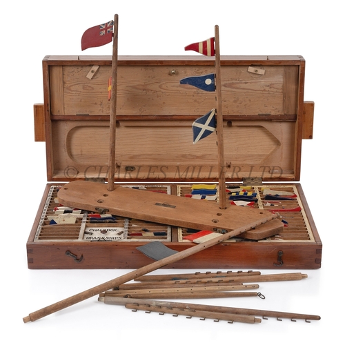 272 - A RARE ROYAL NAVY SIGNAL TRAINING SET, LATE 19TH CENTURY
a substantial wooden case containing a larg... 